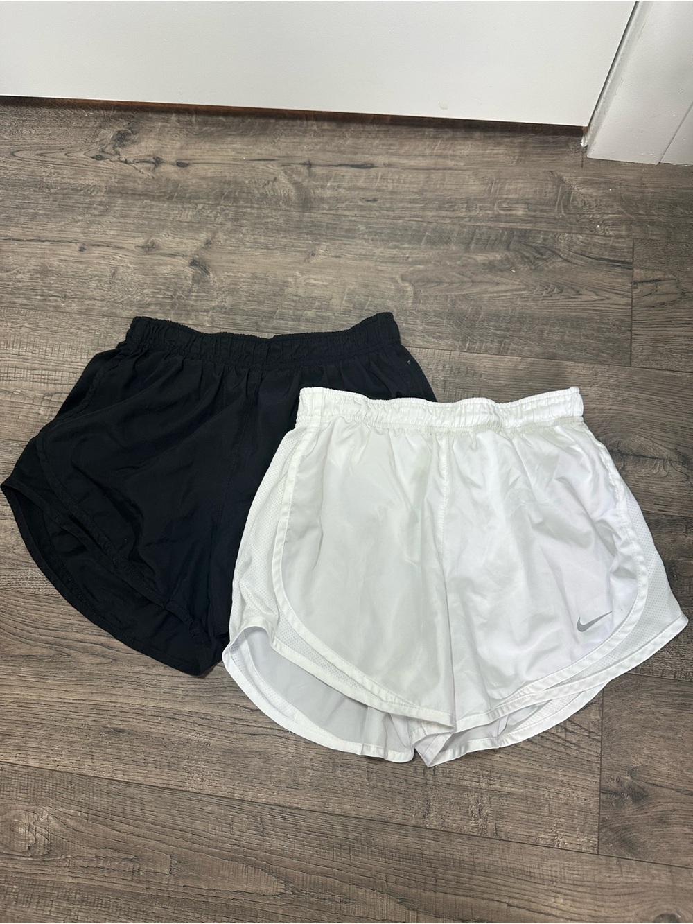 Two pairs Nike Women's Black and White Athletic Running Shorts Duo